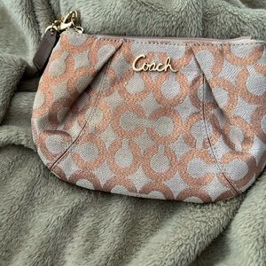 Coach wristlet rose gold signature C